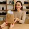 Luxury shopping bag made of natural kraft paper with drawstring for gifts