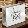 Premium Horizontal Shopper in Glossy White Plasticized Paper with Black Custom Print.