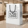 Premium Vertical Shopper in White Glossy Plasticized Paper with Custom Black Print