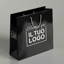 Premium Vertical Shopper in Glossy Black Plasticized Paper with White Custom Print.