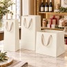 Ivory Paper Shopper with Tape Handle and Wide Bottom, 3 Sizes